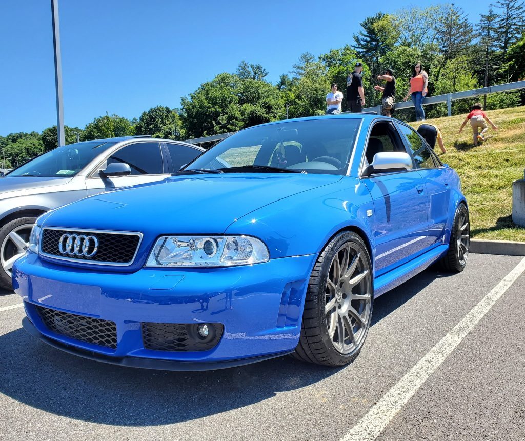 Completed Nogaro blue Audi RS4 restoration and custom paint by Universe Auto Body